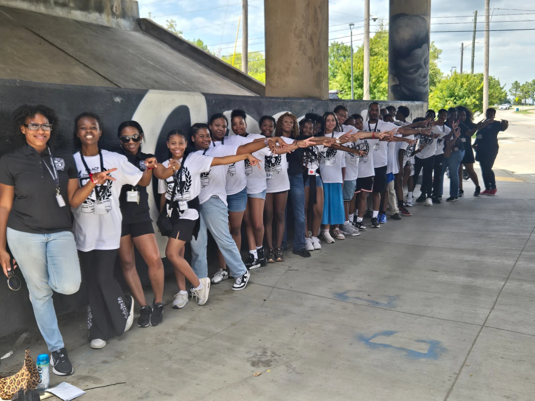 Freedom School scholars standing together during their Tulsa field study