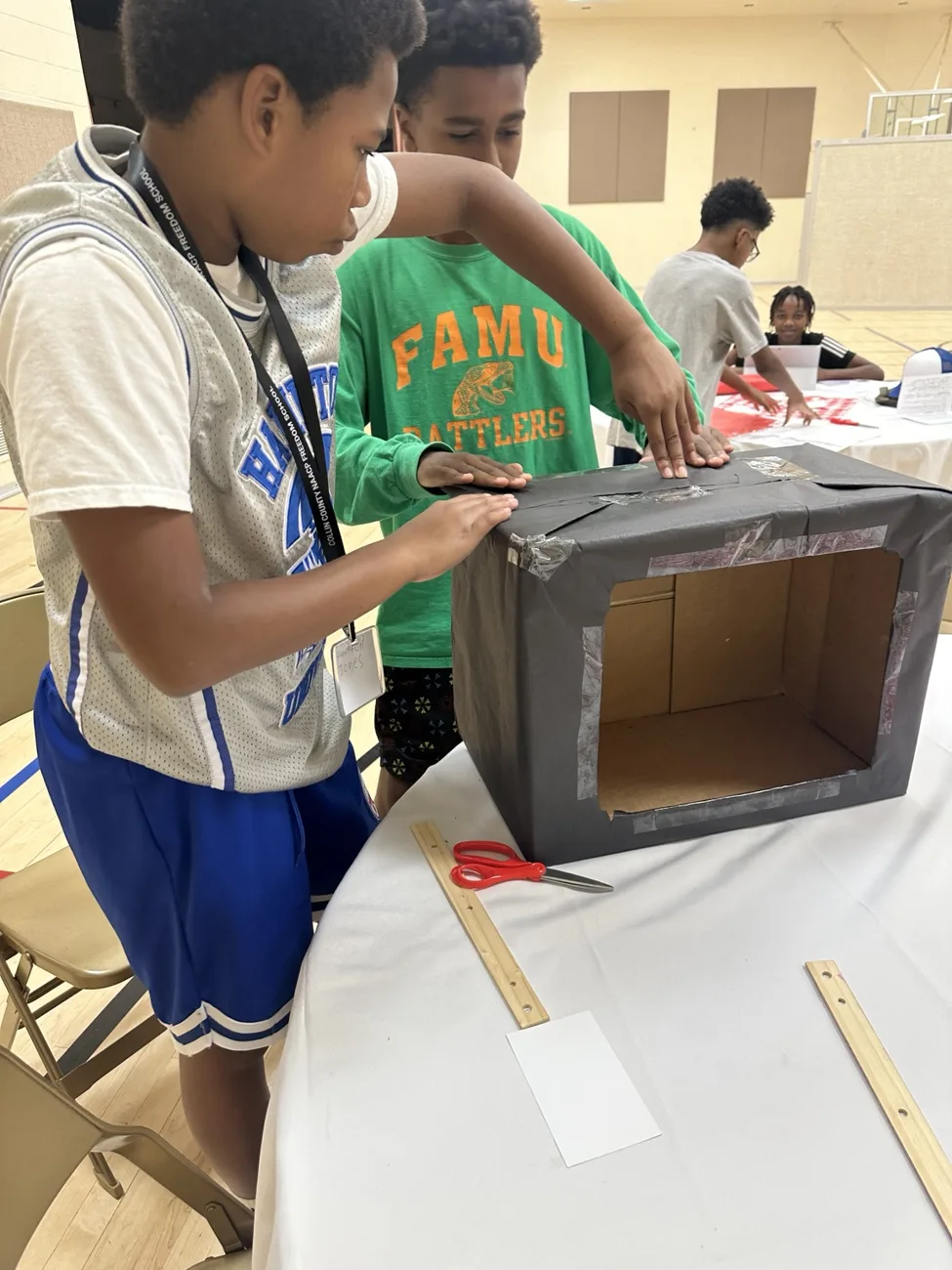 Students working on a model together