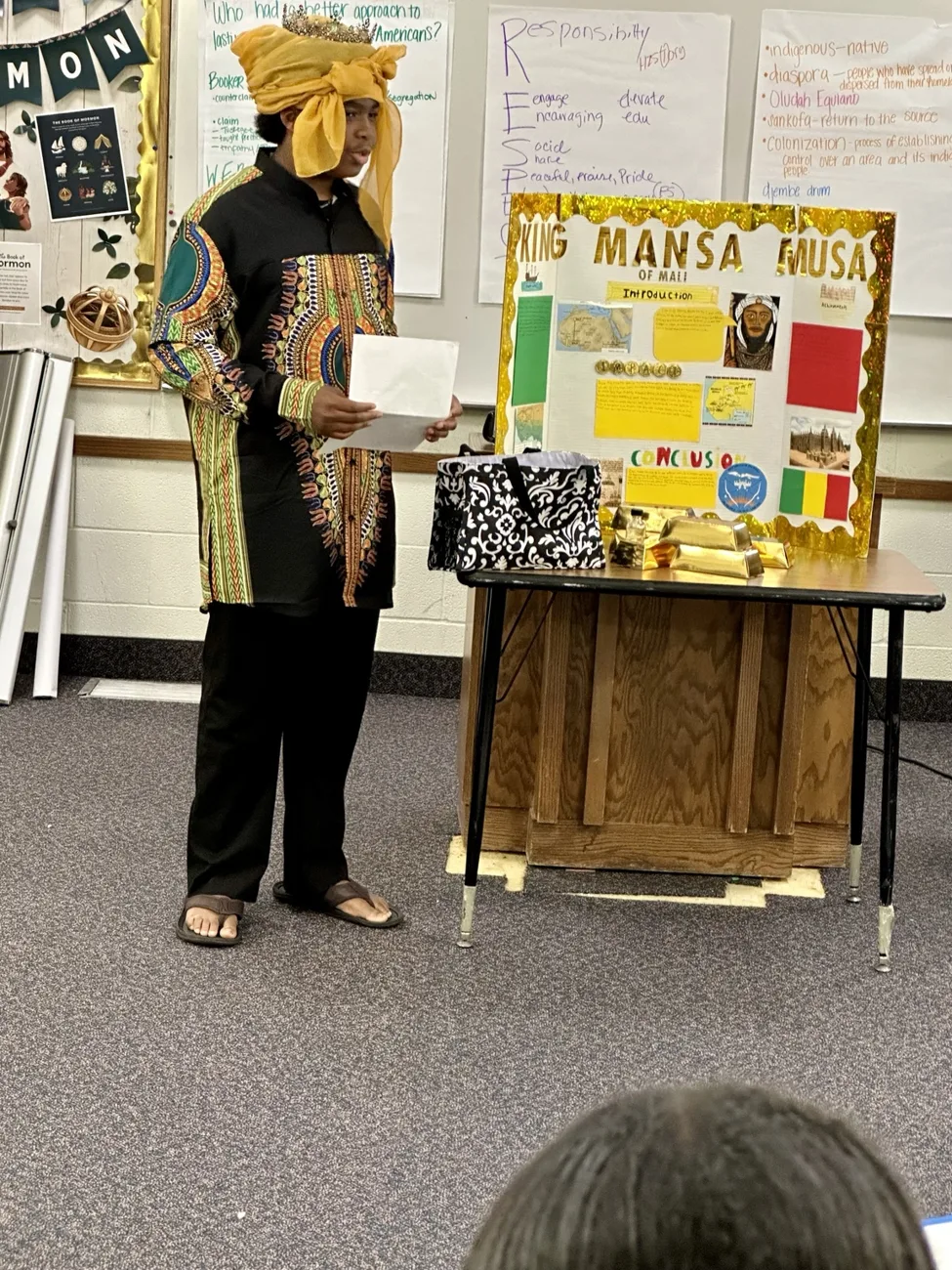 A student presenting a Mansa Musa research project
